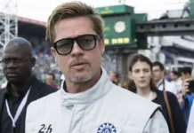 Photo from "F1" (2025), directed by Joseph Kosinski, featuring Brad Pitt, Kerry Condon, and Javier Bardem. A Warner Bros. Pictures production.